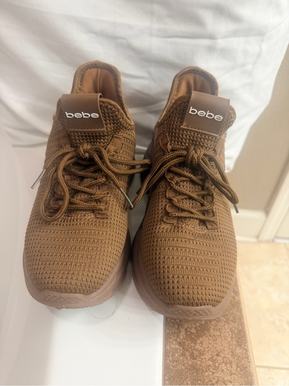 bebe women’s Knit Lace-Up Sneakers in Brown
